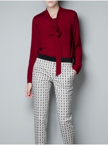 Shirt With Bow Collar - pattern: plain; style: shirt; neckline: pussy bow; predominant colour: burgundy; occasions: casual; length: standard; fibres: polyester/polyamide - 100%; fit: body skimming; sleeve length: long sleeve; sleeve style: standard; texture group: sheer fabrics/chiffon/organza etc.; pattern type: fabric; pattern size: standard