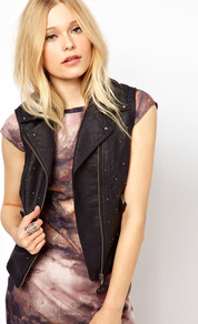 Leather Look Studded Gilet - pattern: plain; sleeve style: sleeveless; style: gilet; collar: asymmetric biker; fit: slim fit; predominant colour: black; occasions: casual; fibres: polyester/polyamide - mix; sleeve length: sleeveless; texture group: leather; collar break: high/illusion of break when open; pattern type: fabric; embellishment: studs
