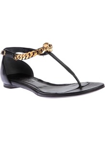 Opis Leather Thong Sandals - secondary colour: gold; predominant colour: black; occasions: casual, evening, holiday; material: leather; heel height: flat; ankle detail: ankle strap; heel: standard; toe: open toe/peeptoe; style: flip flops / toe post; finish: plain; pattern: plain; embellishment: chain/metal