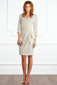 Enna Sleeved Dress - style: faux wrap/wrap; neckline: v-neck; fit: tailored/fitted; pattern: plain; bust detail: ruching/gathering/draping/layers/pintuck pleats at bust; predominant colour: ivory; occasions: evening, work, occasion; length: just above the knee; hip detail: soft pleats at hip/draping at hip/flared at hip; sleeve length: 3/4 length; sleeve style: standard; trends: sculptural frills; pattern type: fabric; texture group: jersey - stretchy/drapey; fibres: viscose/rayon - mix