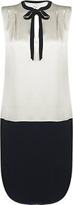 Marina Dress - style: shift; length: mid thigh; sleeve style: sleeveless; neckline: pussy bow; predominant colour: white; secondary colour: black; occasions: casual, evening, occasion; fit: straight cut; fibres: silk - mix; sleeve length: sleeveless; texture group: silky - light; pattern type: fabric; pattern size: standard; pattern: colourblock