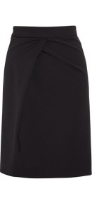 Justice Pleated Skirt - pattern: plain; style: pencil; fit: tailored/fitted; waist: high rise; predominant colour: black; occasions: evening, work; length: on the knee; fibres: wool - stretch; hip detail: soft pleats at hip/draping at hip/flared at hip; texture group: crepes; pattern type: fabric