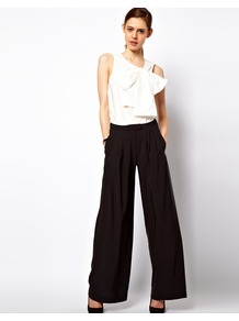 Trousers In Wide Leg - pattern: plain; pocket detail: small back pockets, pockets at the sides; length: extra long; waist: mid/regular rise; predominant colour: black; occasions: casual, evening, work, occasion, holiday; fibres: polyester/polyamide - 100%; fit: wide leg; pattern type: fabric; texture group: jersey - stretchy/drapey; style: standard