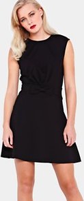 Aruna Jersey Bow Dress Black, Black - style: shift; length: mid thigh; neckline: round neck; fit: fitted at waist; pattern: plain; sleeve style: sleeveless; waist detail: twist front waist detail/nipped in at waist on one side/soft pleats/draping/ruching/gathering waist detail; bust detail: ruching/gathering/draping/layers/pintuck pleats at bust; predominant colour: black; occasions: evening, work, occasion; fibres: polyester/polyamide - mix; hip detail: sculpting darts/pleats/seams at hip; back detail: embellishment at back; sleeve length: sleeveless; trends: glamorous day shifts; pattern type: fabric; texture group: jersey - stretchy/drapey