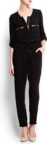 Long Jumpsuit Zippers - length: standard; neckline: round neck; fit: fitted at waist; pattern: plain; hip detail: side pockets at hip; bust detail: pocket detail at bust; waist detail: belted waist/tie at waist/drawstring; predominant colour: black; occasions: casual, evening, holiday; fibres: viscose/rayon - 100%; jeans & bottoms detail: turn ups; sleeve length: 3/4 length; sleeve style: standard; style: jumpsuit; pattern type: fabric; texture group: jersey - stretchy/drapey