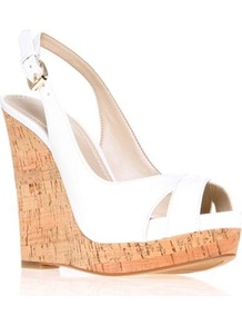 Laffnplay3 - predominant colour: white; occasions: casual, evening, holiday; material: leather; heel height: high; heel: wedge; toe: open toe/peeptoe; style: standard; finish: patent; pattern: plain