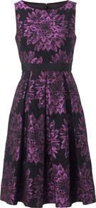 Paulina Dress, Dahlia - neckline: round neck; sleeve style: sleeveless; style: prom dress; waist detail: fitted waist, narrow waistband; predominant colour: purple; occasions: evening, occasion; length: on the knee; fit: fitted at waist & bust; fibres: polyester/polyamide - mix; hip detail: structured pleats at hip; sleeve length: sleeveless; texture group: ornate wovens; trends: high impact florals; pattern type: fabric; pattern size: standard; pattern: florals