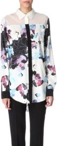 Silk Floral Shirt - neckline: shirt collar/peter pan/zip with opening; bust detail: sheer at bust, added detail/embellishment at bust, buttons at bust (in middle at breastbone)/zip detail at bust, contrast pattern/fabric/detail at bust; length: below the bottom; style: shirt; shoulder detail: contrast pattern/fabric at shoulder; predominant colour: white; occasions: casual, evening, work; fibres: silk - mix; fit: straight cut; hip detail: dip hem; back detail: sheer fabric at back, longer hem at back than at front; sleeve length: long sleeve; sleeve style: standard; texture group: crepes; trends: high impact florals; pattern type: fabric; pattern size: big & busy; pattern: florals