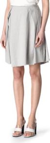 Liberty Twill Skirt - pattern: plain; style: full/prom skirt; fit: loose/voluminous; waist detail: fitted waist, twist front waist detail/nipped in at waist on one side/soft pleats/draping/ruching/gathering waist detail; waist: high rise; predominant colour: light grey; occasions: casual, evening, work; length: just above the knee; fibres: linen - mix; hip detail: structured pleats at hip, soft pleats at hip/draping at hip/flared at hip; texture group: linen; trends: volume; pattern type: fabric; pattern size: standard