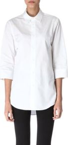 Long Length Shirt - neckline: shirt collar/peter pan/zip with opening; pattern: plain; length: below the bottom; style: shirt; bust detail: buttons at bust (in middle at breastbone)/zip detail at bust; predominant colour: white; occasions: casual, work; fibres: cotton - 100%; fit: straight cut; hip detail: dip hem; back detail: longer hem at back than at front; sleeve length: 3/4 length; sleeve style: standard; texture group: cotton feel fabrics; pattern type: fabric; pattern size: standard