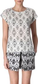 Sorcha I Kat Top - neckline: round neck; sleeve style: capped; predominant colour: ivory; occasions: casual, evening, work; length: standard; style: top; fibres: silk - 100%; fit: straight cut; sleeve length: short sleeve; texture group: crepes; trends: statement prints, modern geometrics; pattern type: fabric; pattern size: standard; pattern: patterned/print