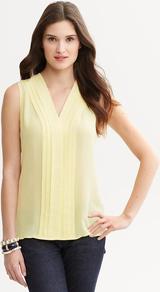 Yellow Silk Pleat Front Blouse - neckline: v-neck; sleeve style: sleeveless; style: blouse; bust detail: ruching/gathering/draping/layers/pintuck pleats at bust; predominant colour: primrose yellow; occasions: casual, evening, work; length: standard; fibres: silk - 100%; fit: straight cut; sleeve length: sleeveless; texture group: silky - light; pattern type: fabric; pattern size: standard