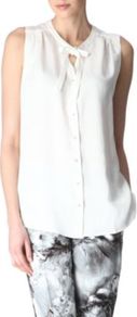 Button Front Shirt - pattern: plain; sleeve style: sleeveless; style: blouse; predominant colour: white; occasions: casual, work; length: standard; neckline: peep hole neckline; fit: body skimming; sleeve length: sleeveless; fibres: viscose/rayon - mix