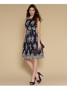 Alisa Prom Dress - neckline: round neck; sleeve style: sleeveless; style: prom dress; waist detail: belted waist/tie at waist/drawstring; secondary colour: white; predominant colour: navy; occasions: evening, occasion; length: just above the knee; fit: fitted at waist & bust; fibres: polyester/polyamide - 100%; sleeve length: sleeveless; texture group: cotton feel fabrics; trends: volume; pattern type: fabric; pattern size: standard; pattern: patterned/print; embellishment: embroidered