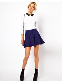 Skirt In Skater Style - length: mini; pattern: plain; fit: loose/voluminous; waist detail: elasticated waist, fitted waist, narrow waistband; waist: mid/regular rise; predominant colour: navy; occasions: casual, evening; style: a-line; fibres: polyester/polyamide - stretch; hip detail: structured pleats at hip; trends: volume; pattern type: fabric; pattern size: standard; texture group: jersey - stretchy/drapey