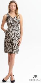 Br Monogram - style: shift; neckline: v-neck; fit: tailored/fitted; sleeve style: sleeveless; waist detail: fitted waist; bust detail: ruching/gathering/draping/layers/pintuck pleats at bust; secondary colour: ivory; predominant colour: black; occasions: evening, work, occasion, holiday; length: just above the knee; fibres: cotton - mix; hip detail: sculpting darts/pleats/seams at hip; sleeve length: sleeveless; pattern type: fabric; pattern size: big & busy; pattern: animal print; texture group: jersey - stretchy/drapey