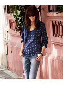 Blouse - neckline: low v-neck; style: blouse; predominant colour: navy; occasions: casual; length: standard; fibres: polyester/polyamide - 100%; fit: loose; hip detail: dip hem; back detail: longer hem at back than at front; sleeve length: long sleeve; sleeve style: standard; texture group: cotton feel fabrics; trends: modern geometrics; pattern type: fabric; pattern size: small & light; pattern: patterned/print