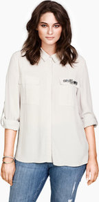 + Blouse - neckline: shirt collar/peter pan/zip with opening; bust detail: added detail/embellishment at bust, pocket detail at bust; style: blouse; predominant colour: ivory; occasions: casual, evening, work; length: standard; fibres: polyester/polyamide - 100%; fit: loose; sleeve length: 3/4 length; sleeve style: standard; texture group: crepes; pattern type: fabric; pattern size: standard; embellishment: beading