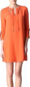 Kea Dress - style: smock; length: mid thigh; fit: loose; pattern: plain; bust detail: added detail/embellishment at bust; shoulder detail: contrast pattern/fabric at shoulder; predominant colour: bright orange; occasions: casual, evening, work, occasion, holiday; fibres: polyester/polyamide - 100%; neckline: crew; sleeve length: 3/4 length; sleeve style: standard; texture group: crepes; trends: glamorous day shifts, fluorescent; pattern type: fabric; pattern size: standard