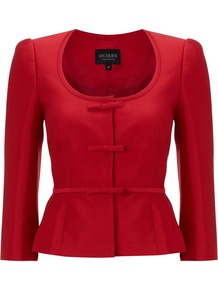 Fortuna Jacket, Ruby - pattern: plain; style: single breasted blazer; collar: round collar/collarless; predominant colour: true red; occasions: evening, work, occasion; length: standard; fit: tailored/fitted; fibres: wool - mix; waist detail: peplum detail at waist; sleeve length: 3/4 length; sleeve style: standard; collar break: medium; pattern type: fabric; texture group: woven light midweight