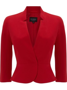 Women's Neive Jacket, Ruby - pattern: plain; style: single breasted blazer; collar: round collar/collarless; predominant colour: true red; occasions: evening, work, occasion; length: standard; fit: tailored/fitted; fibres: polyester/polyamide - mix; waist detail: peplum detail at waist; sleeve length: 3/4 length; sleeve style: standard; texture group: crepes; collar break: medium; pattern type: fabric